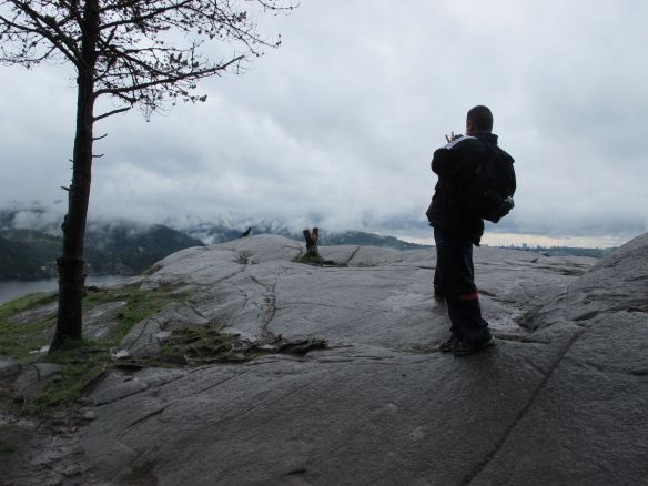 Mr. M and Sergio watching the bird on the edge of the rock